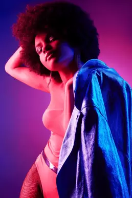 woman disco fashion purple blue