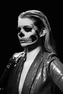 woman skull makeup glitter vest